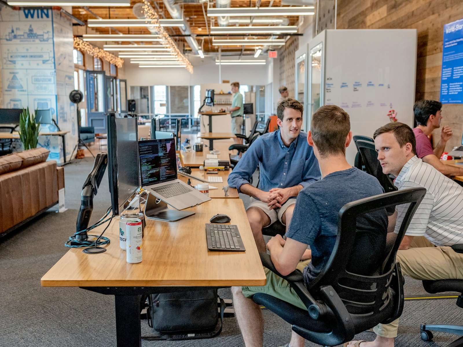 A supportive team conversation in a bright office